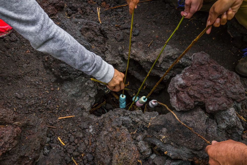 People roasting marshmallows at Pacaya Volcano