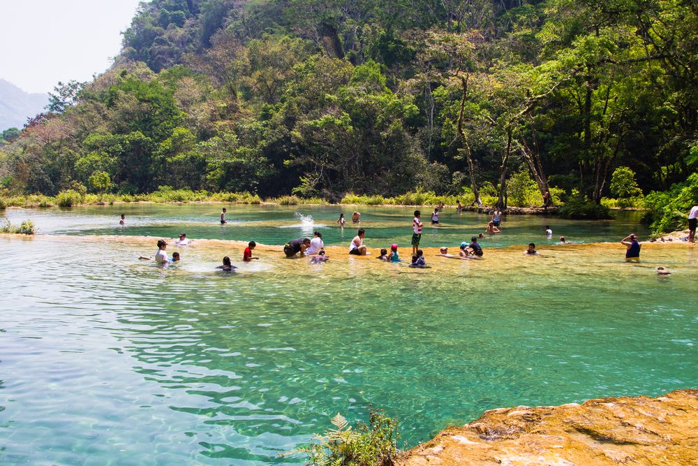 People swimming in Semuc Champey