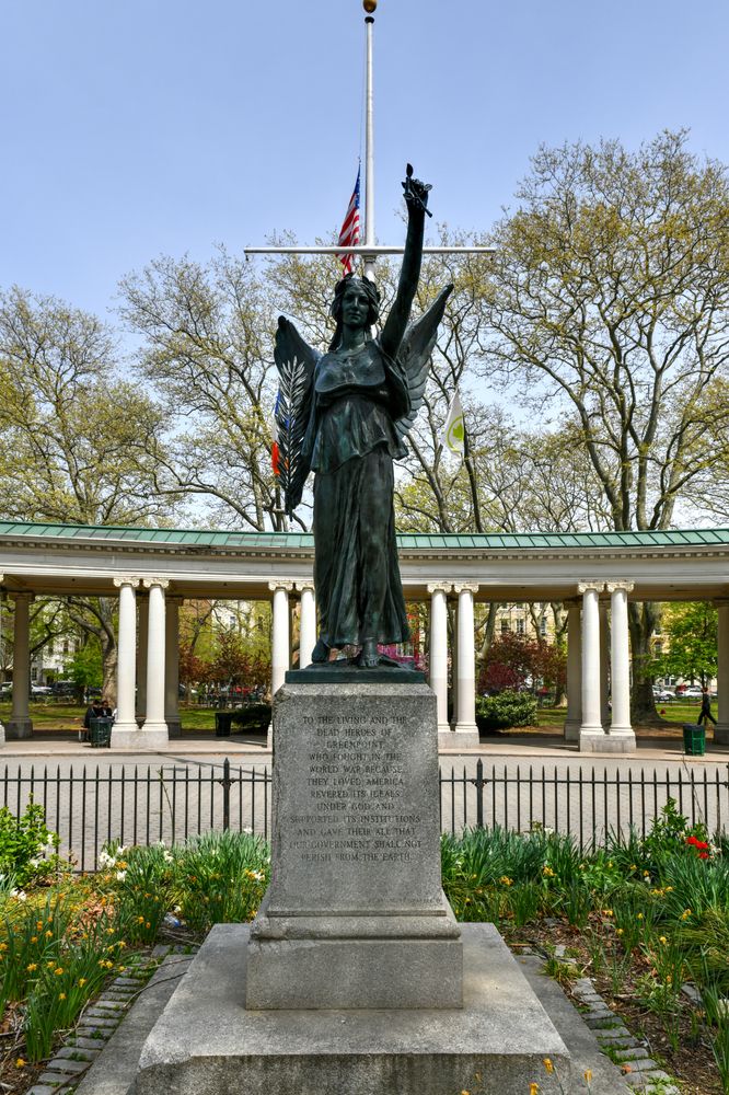 A statue at Monsignor McGolrick Park