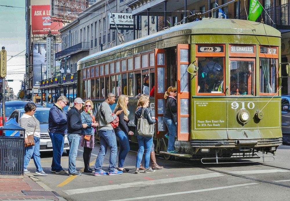 People boarding the St. Charles Streetcar