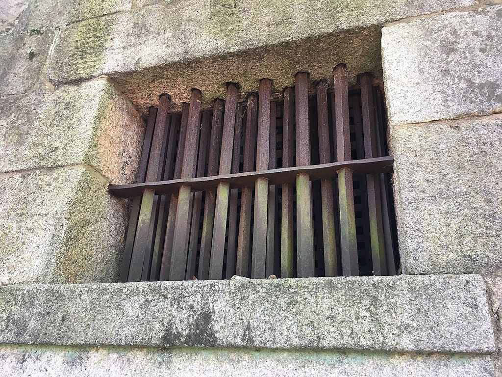 Metal window of The Old Gaol