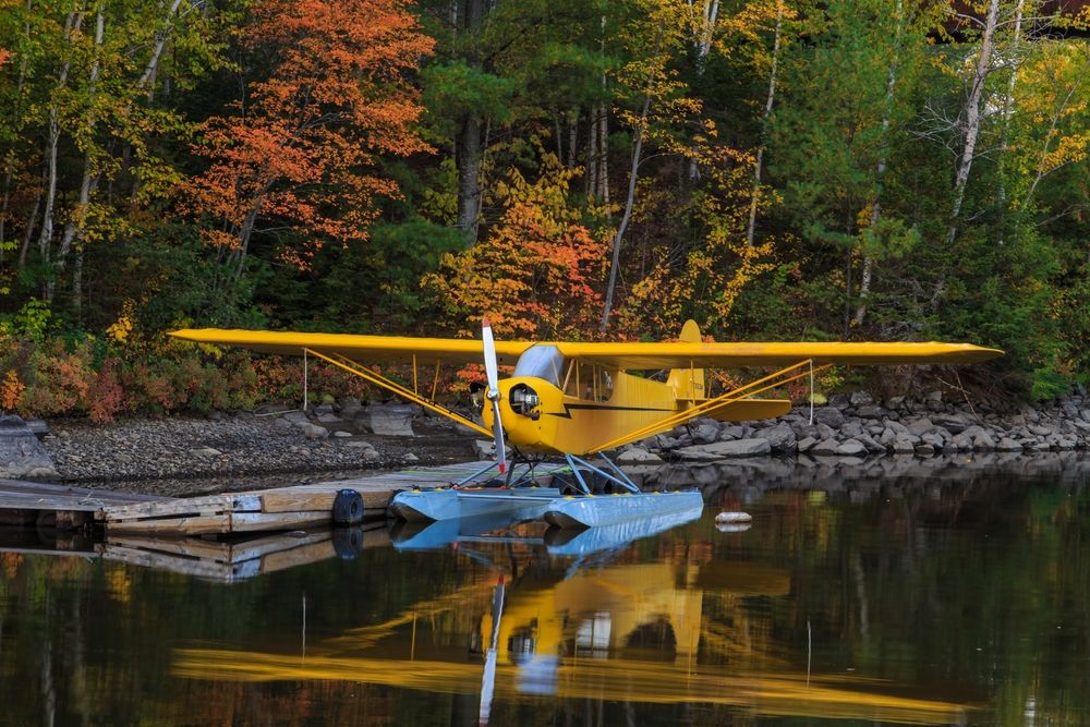 A seaplane docked at Moosehead Lake