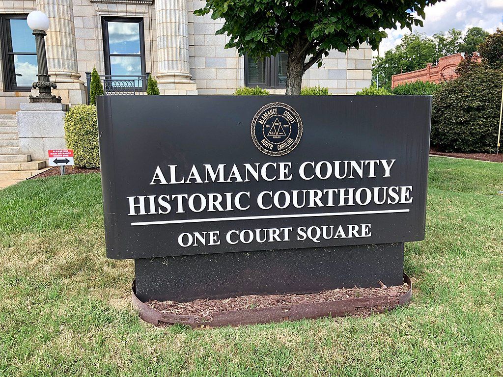 Welcome sign of the Alamance County Historic Courthouse