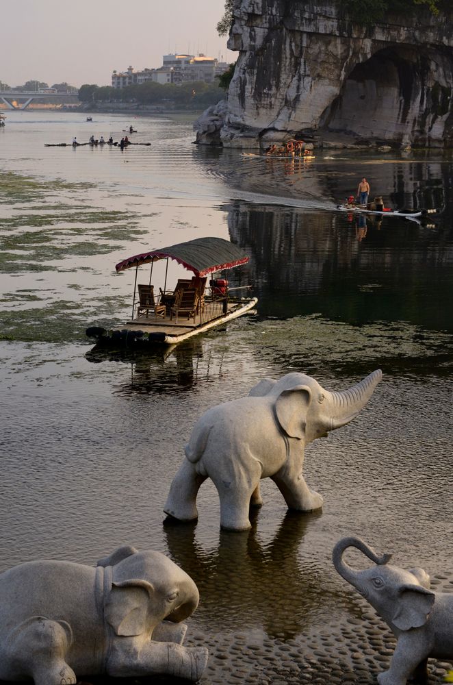 Elephants sculptures on the shore of Two Rivers and Four Lakes