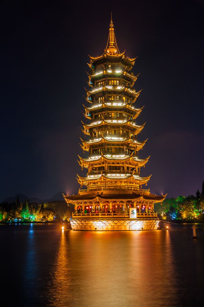 Night lights of Riyue Shuangta Cultural Park's pagoda