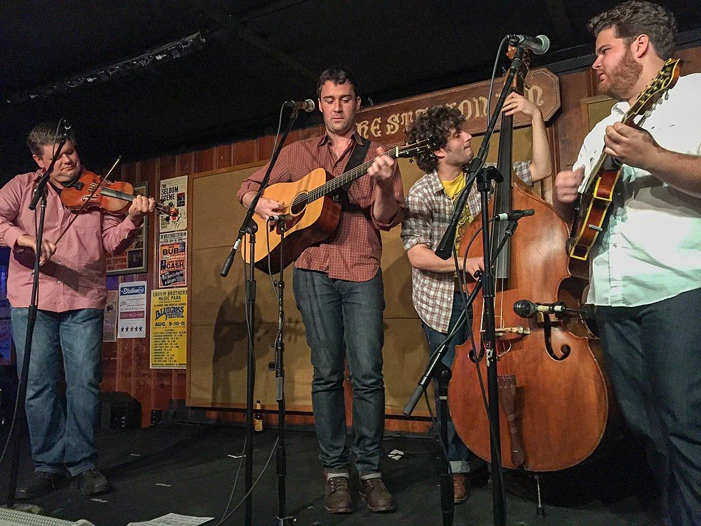 A band playing instruments in Station Inn