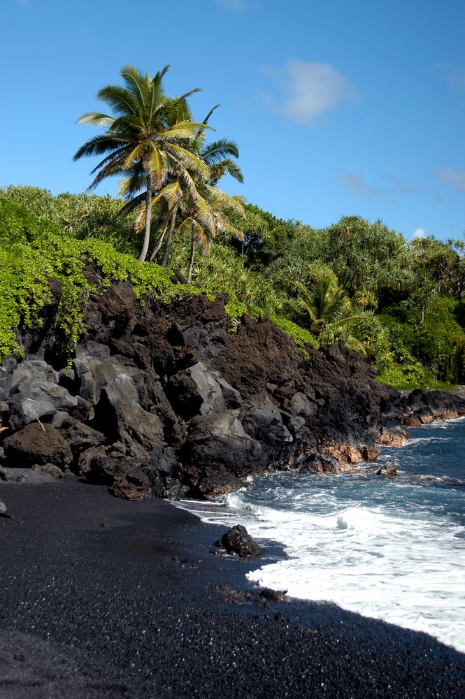 Waves crashing on Waianapanapa State Park's black sand