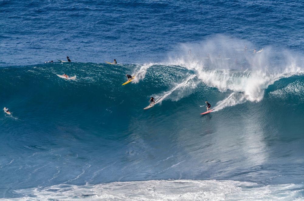 Surfers at Waimea Bay Beach Park