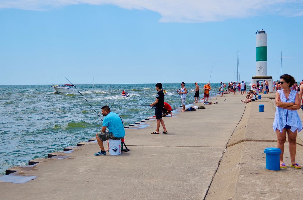 People fishing at Holland State Park