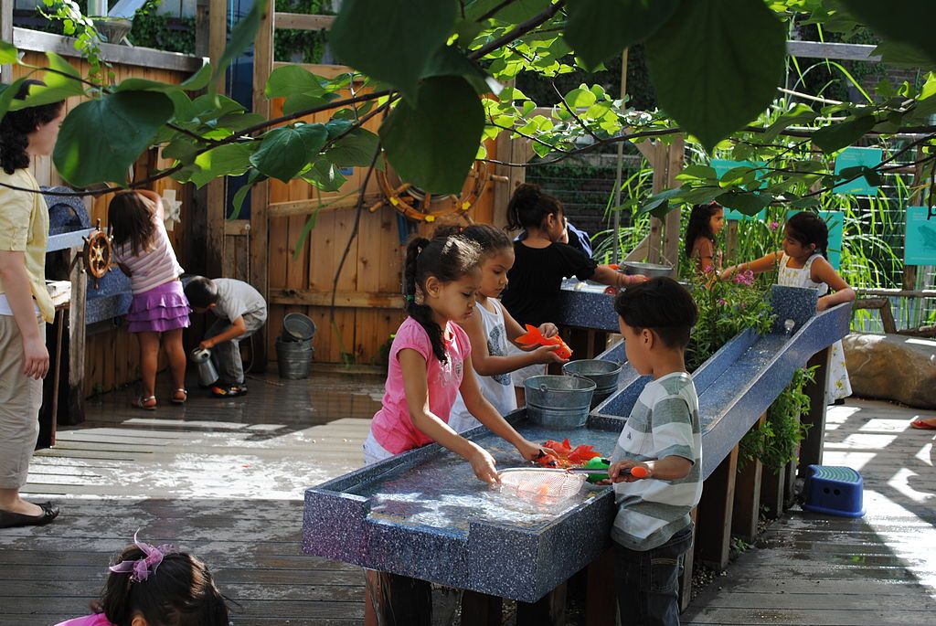 Children playing at Long Island Children's Museum backyard space