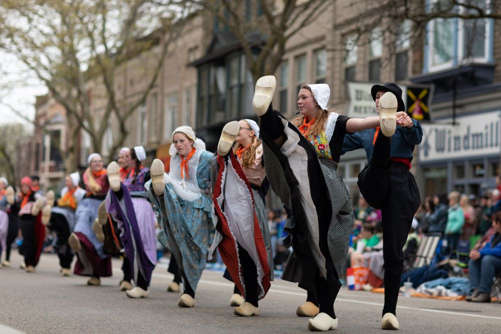 People dancing on the street for Tulip Time Festival