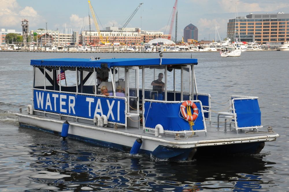 People riding a Baltimore Water Taxi