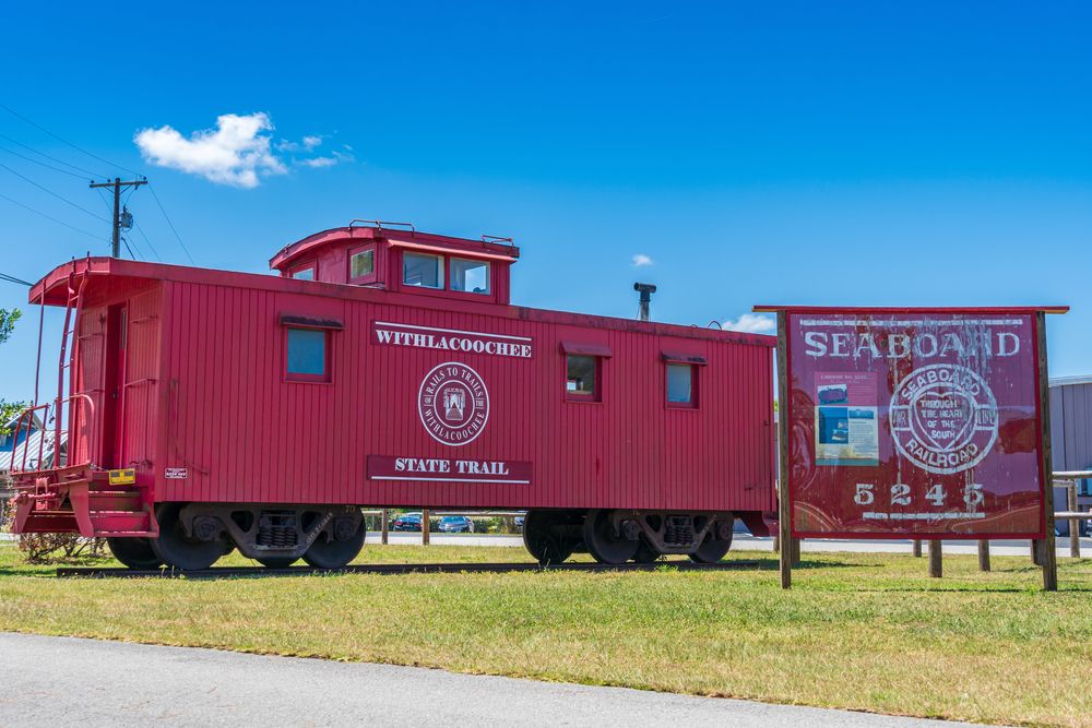 Name sign of Withlacoochee State Trail on a container vehicle