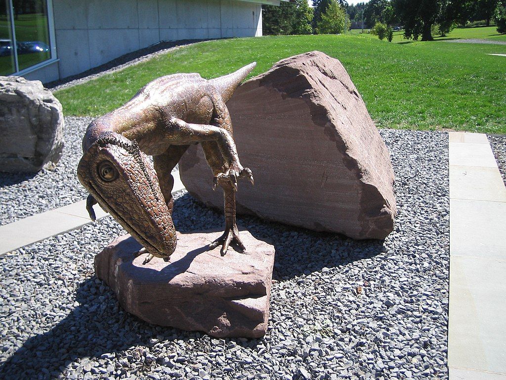 A dinosaur sculpture on the grounds of Museum of the Earth