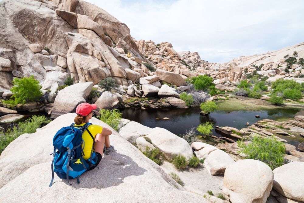 A woman admiring the Barker Dam