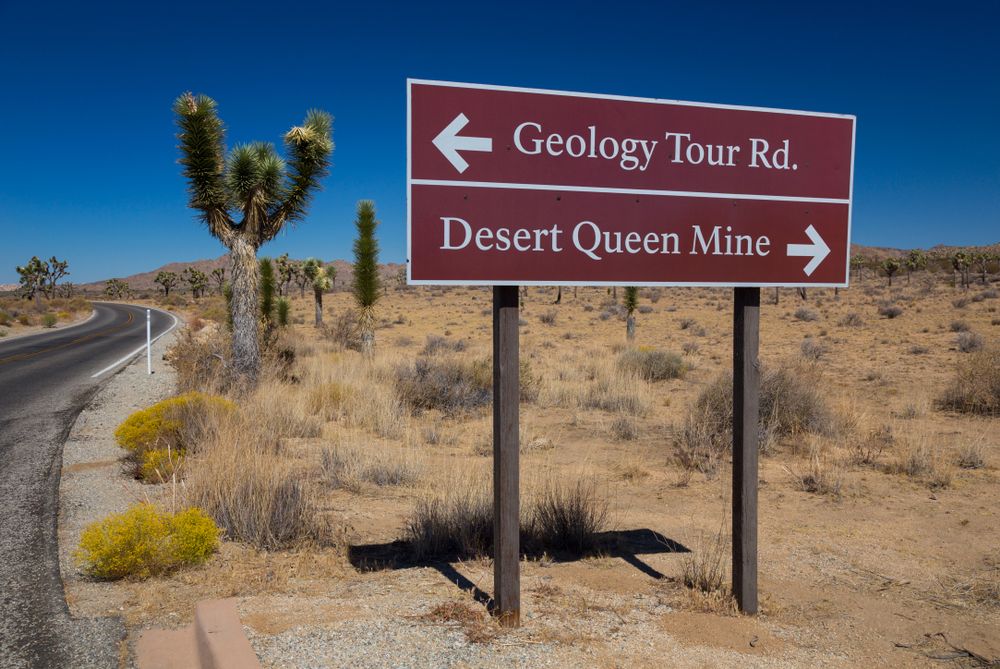 Road sign of Desert Queen Mine