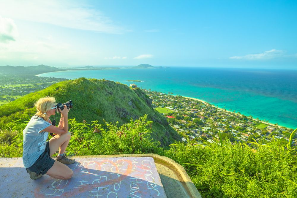 A person taking photo at Lanikai Pillboxes Trail