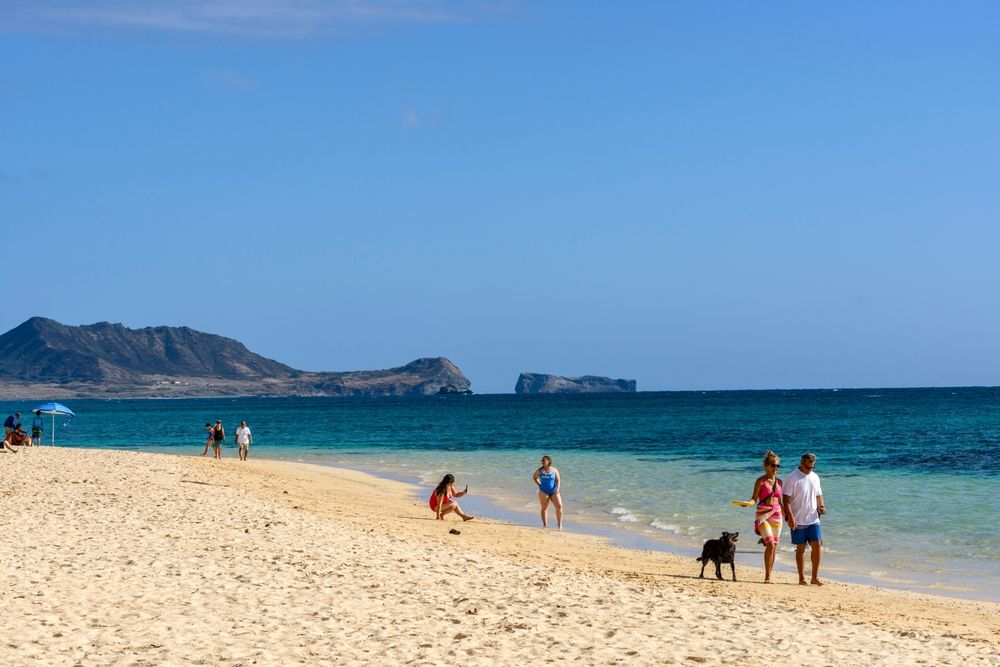 People walking along Lanikai Beach