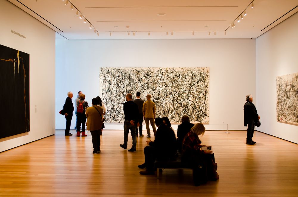 People admiring art in Museum of Modern Art