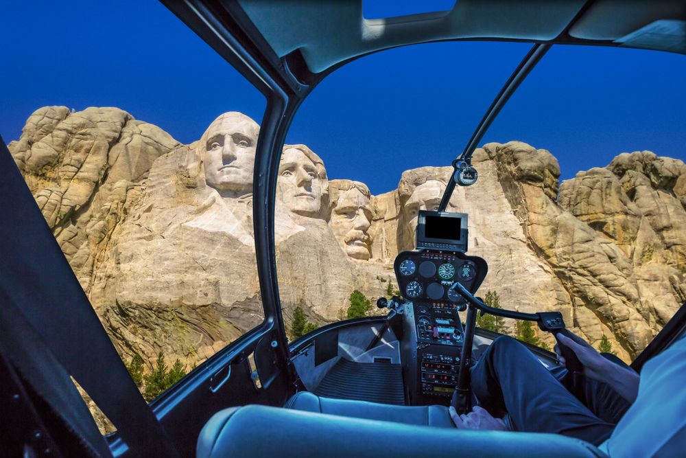 View of Mount Rushmore from inside a helicopter