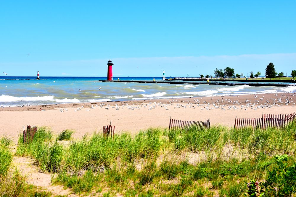 View of a lighthouse from Simmons Island Beach
