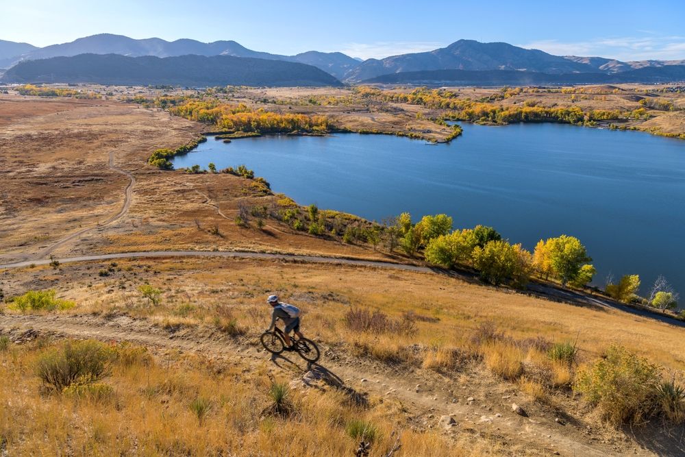 A person riding a bike at Bear Creek Lake Park