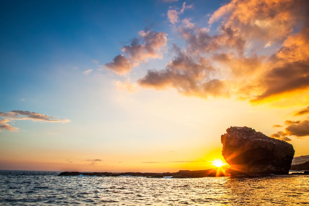 Sunset and the silhouette of Puu Pehe