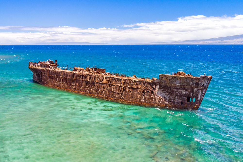 The rusty tanker afloat on Shipwreck Beach