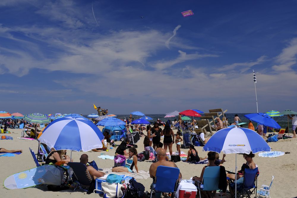 People enjoying the sun at Seven Presidents Oceanfront Park
