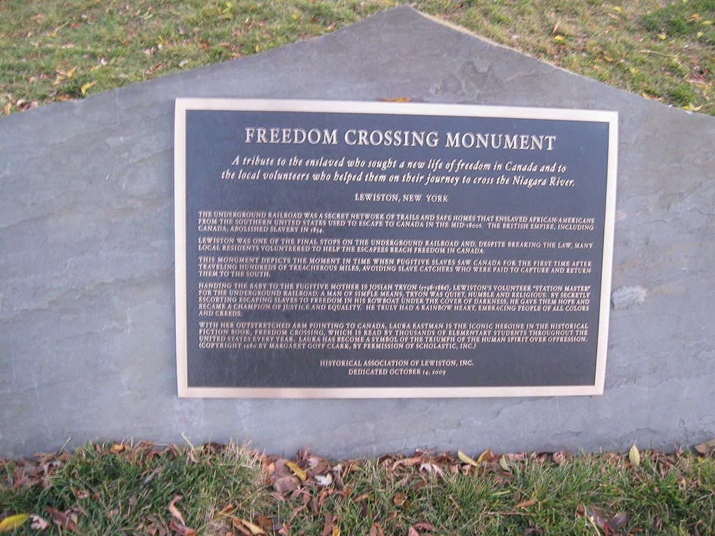History plaque of Freedom Crossing Monument
