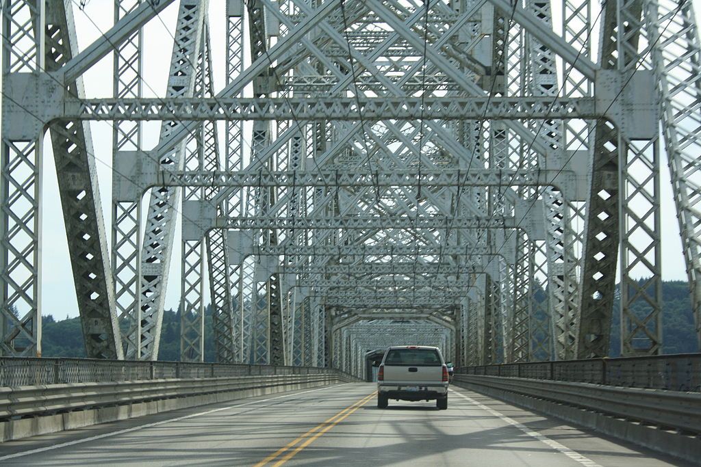 A car driving along Lewis and Clark Bridge