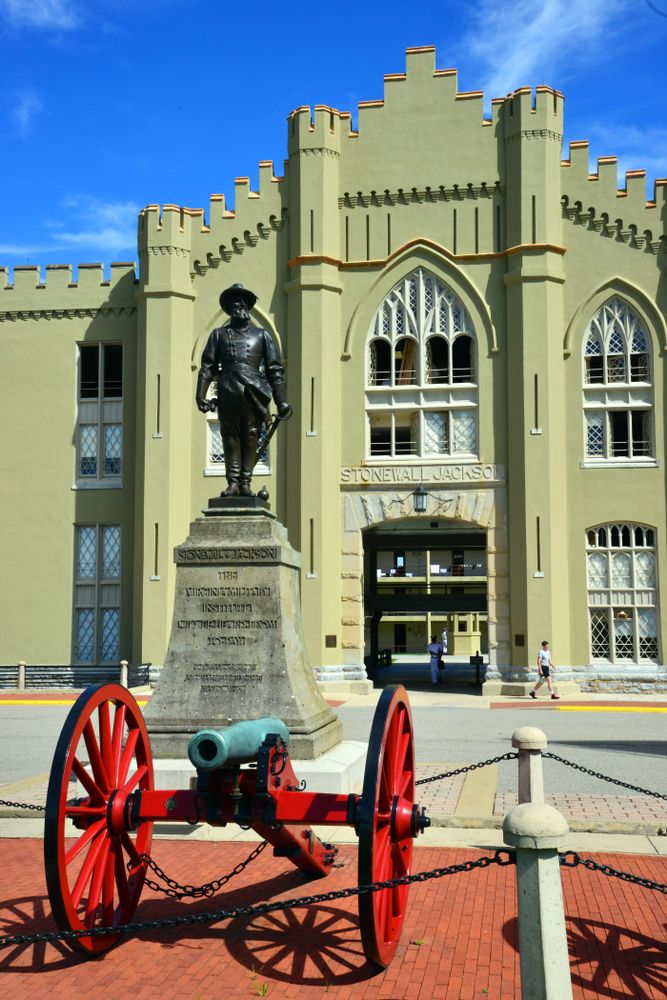 A statue in front of Virginia Military Institute's building