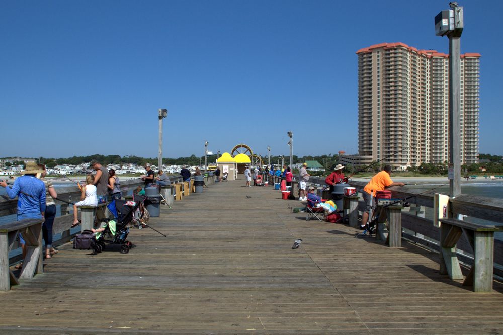 People fishing on the Apache Pier