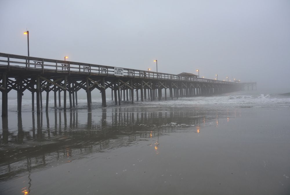 Thick fog covering Springmaid Beach Pier
