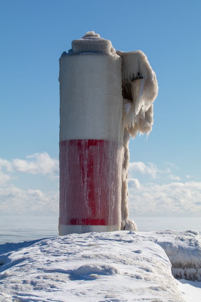 Snow-covered Two Rivers North Pierhead Lighthouse