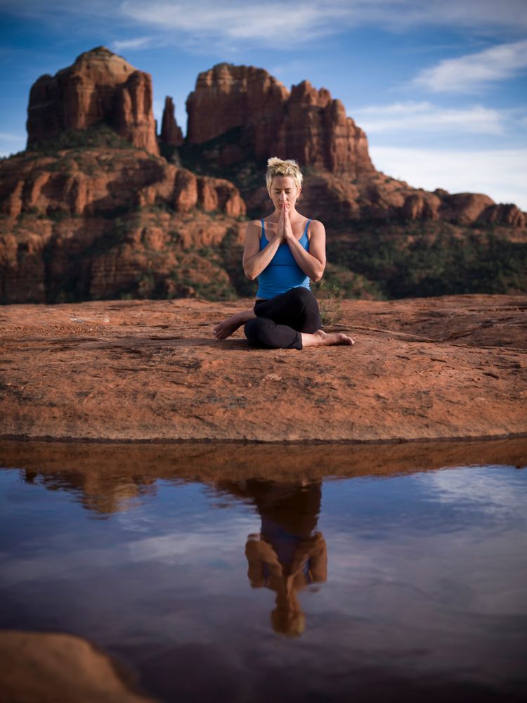 A Woman meditating in Cathedral rock