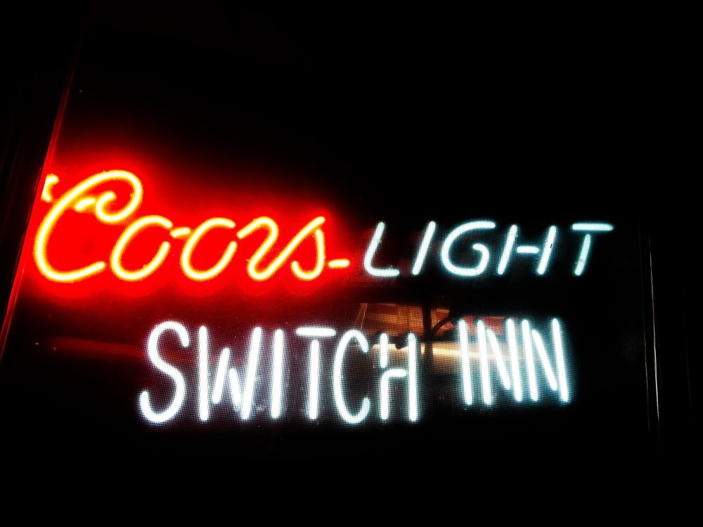 Neon sign of the Switch Inn