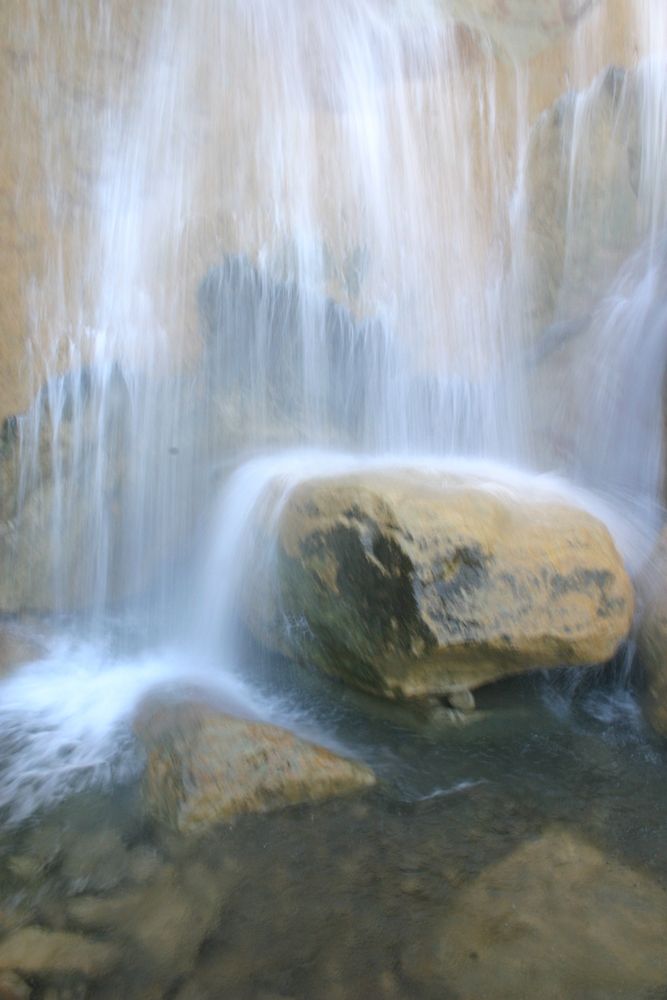 Tangerine Falls water hitting big rocks