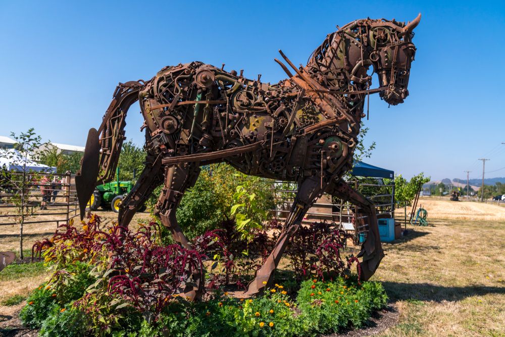 A horse sculpture made out of farming equipments in Yamhill Valley Heritage Center