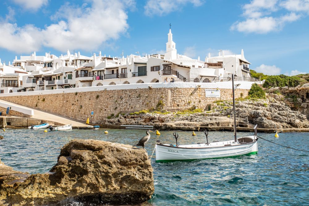 A boat on the waters of Binibeca