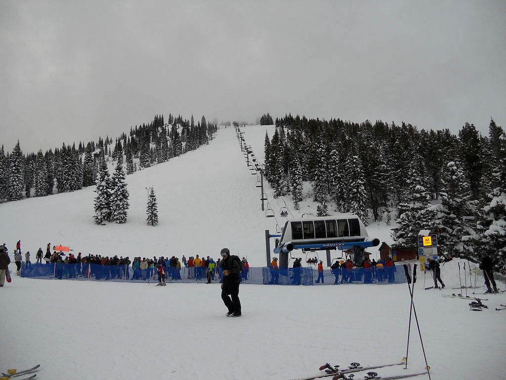 Mt Shasta ski park base with people wearing jackets.