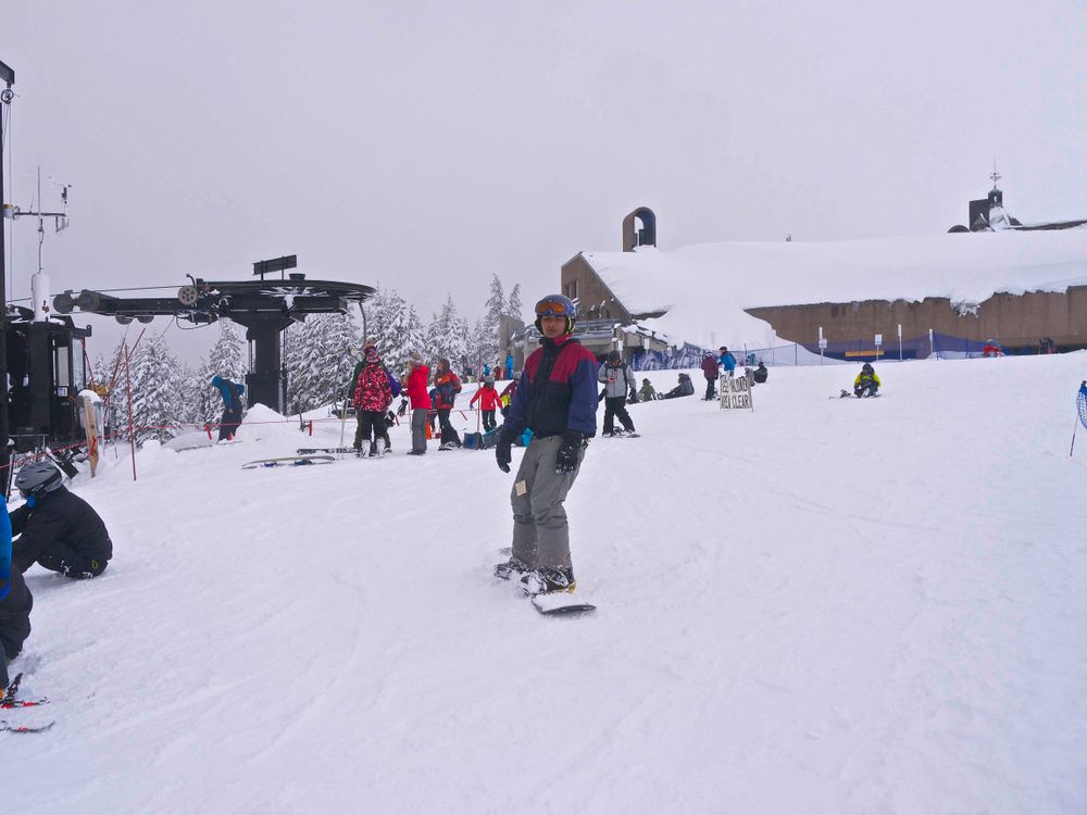 A person snowboarding at Timberline Resort