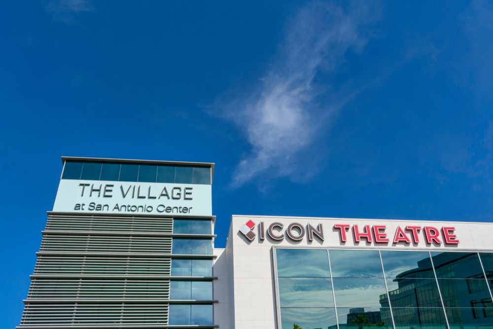 Building sign of The Village at San Antonio Center