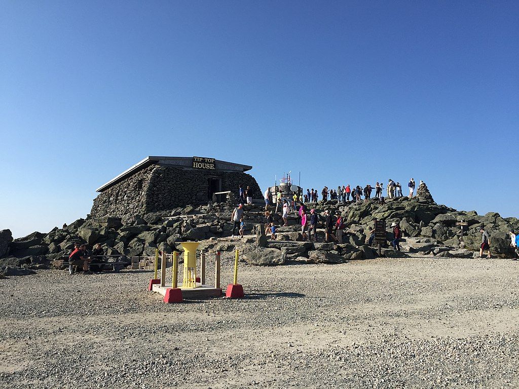 People admiring the Tiptop House