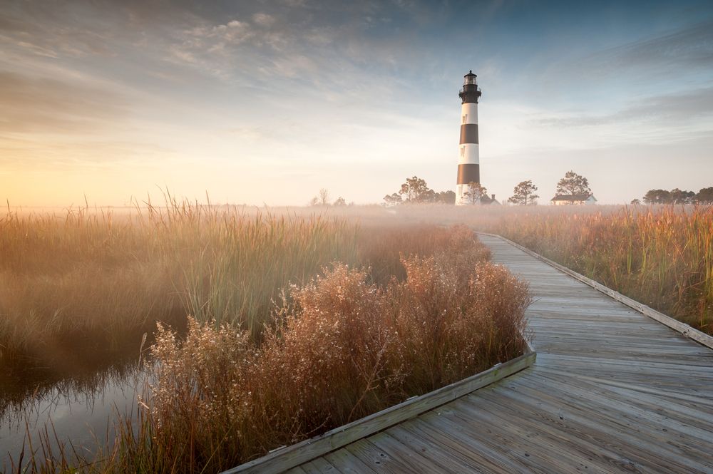 Wooden pathway leading to Bodie Island Lighthouse