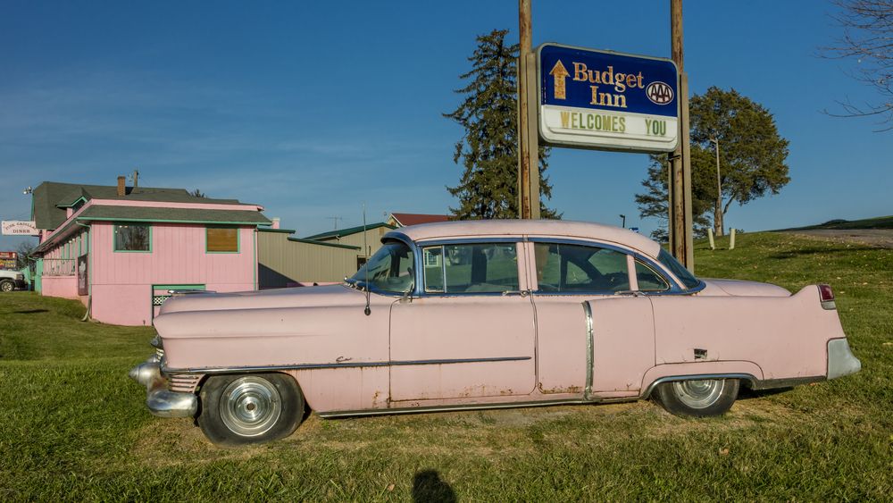 A pink vehicle beside the Pink Cadillac Diner