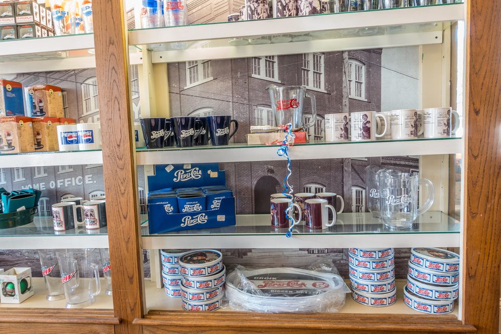 Mugs displayed in the Birthplace of Pepsi
