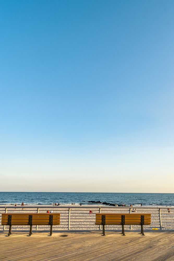 Wooden benches at Long Beach Boardwalk and Beach Park