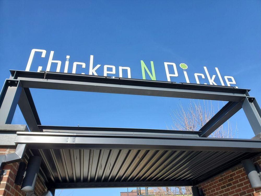 Building sign of Chicken N Pickle