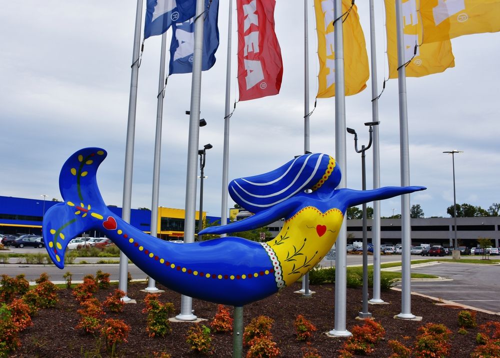 A Norfolk Mermaid Statue in front of IKEA